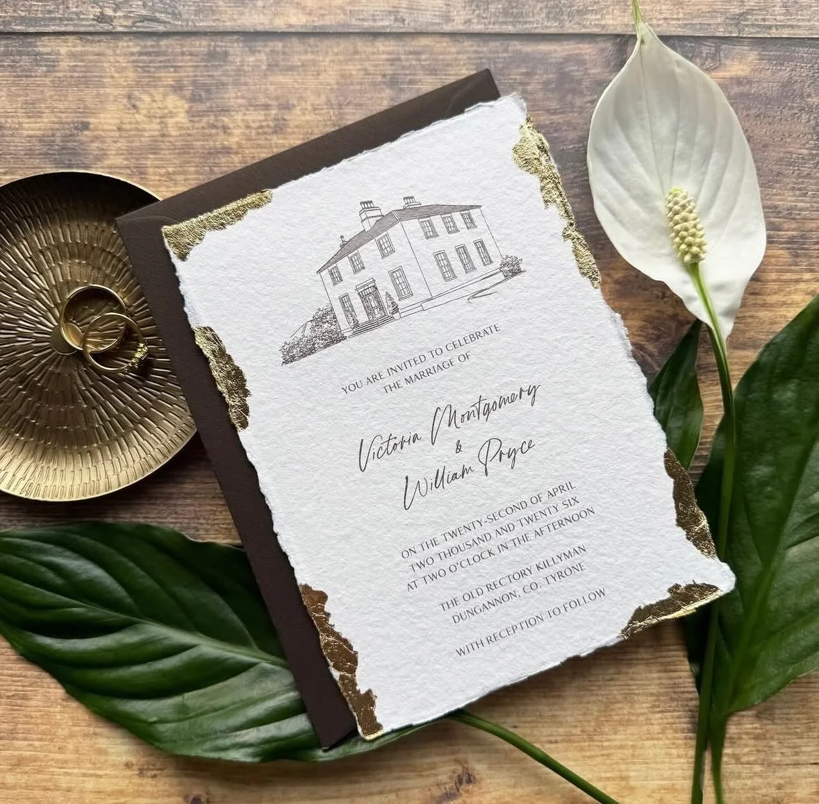VICTORIA - Featuring a bespoke venue illustration on handmade ivory paper, with gold leaf detailing and a cocoa toned envelope, it&rsquo;s a little piece of luxury to hold in your hands
.
.
.
#weddingstationery #weddinginvitation #venueillustration #