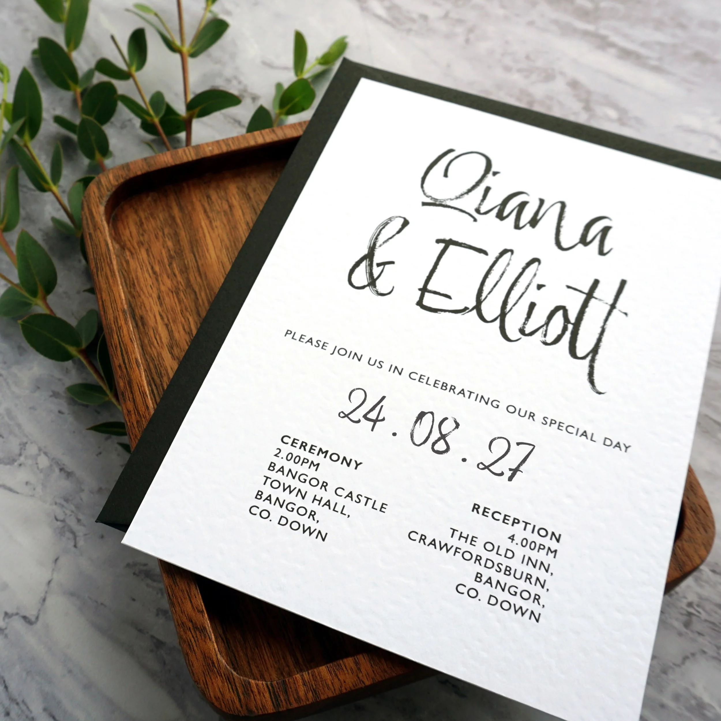 QIANA - Italian cardstock, jet black envelope, and a brush of love&hellip; every detail designed in monochrome magic. From the soft texture of the paper to the bold simplicity of black and white, this invitation captures a vision that&rsquo;s modern,