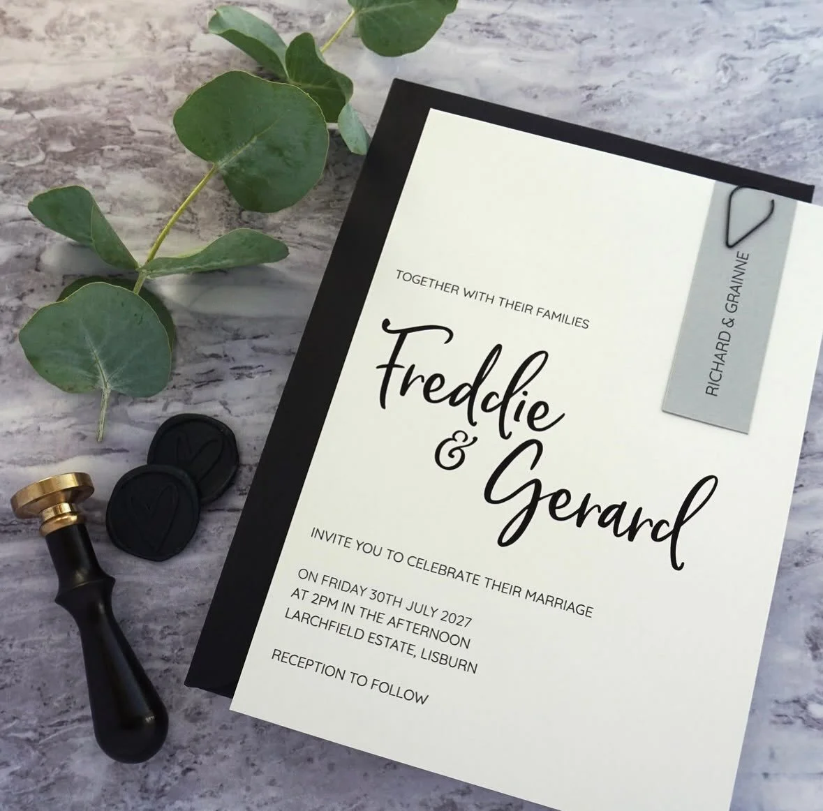 FREDDIE - With stunning black foiling, soft grey cardstock and a personalised guest tag, this invite just screams luxury. If you want to make a statement then this suite is for you, paired with a jet black envelope and teardrop clip for some extra dr