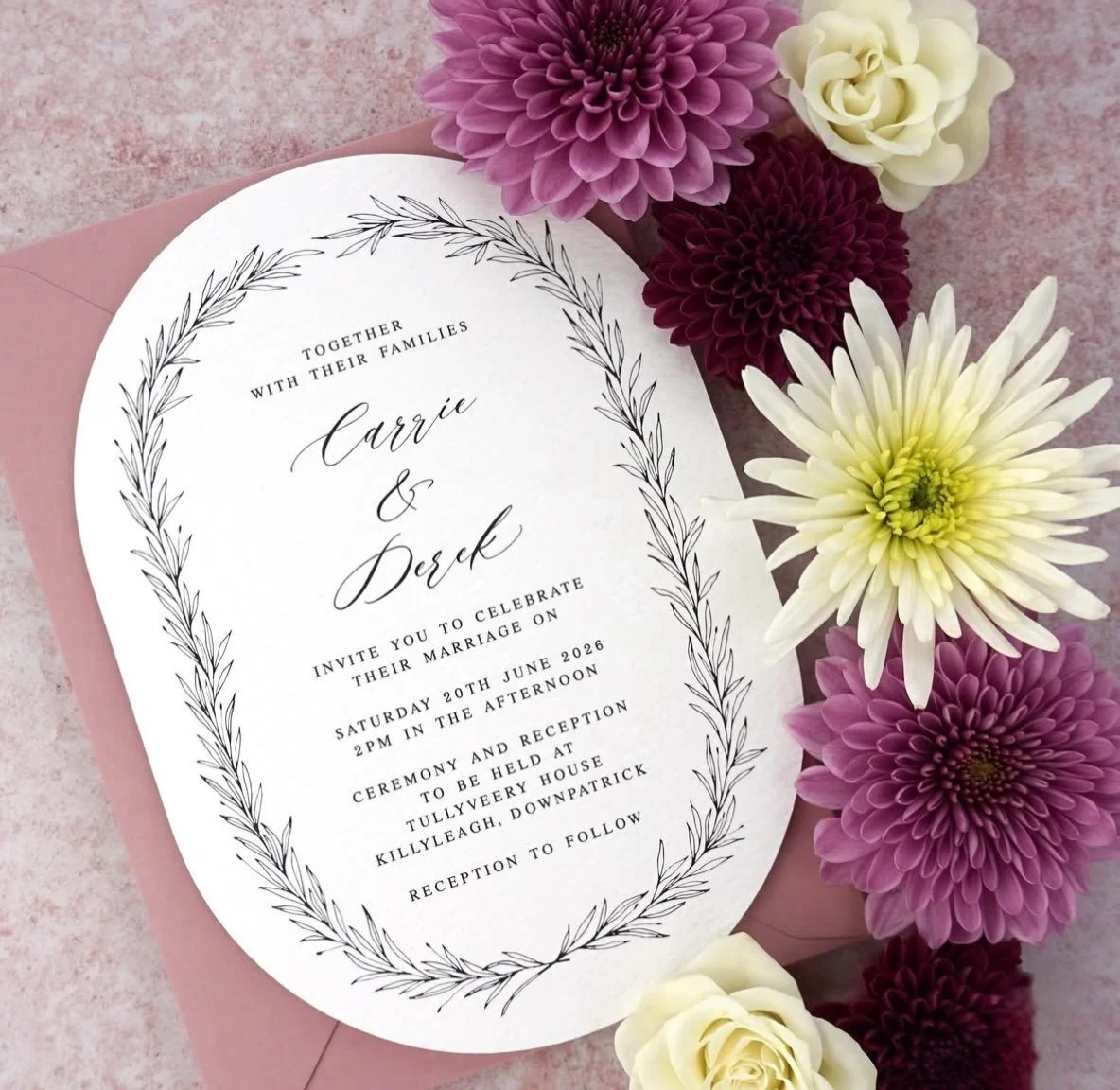CARRIE - This double arched shape adds a playful touch to this minimalist invitation. Printed on highly textured cardstock, the shape and texture combination makes for a tactile experience. Paired here with a luxury dusty pink envelope, but feel free