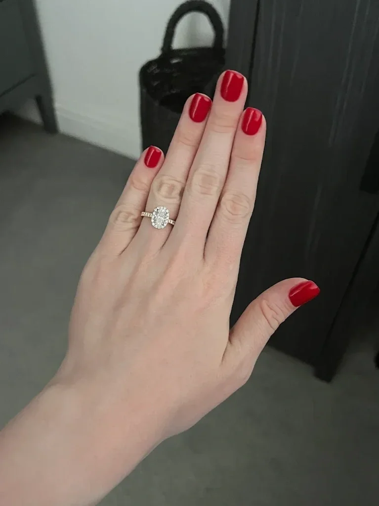 oval diamond halo engagement ring
