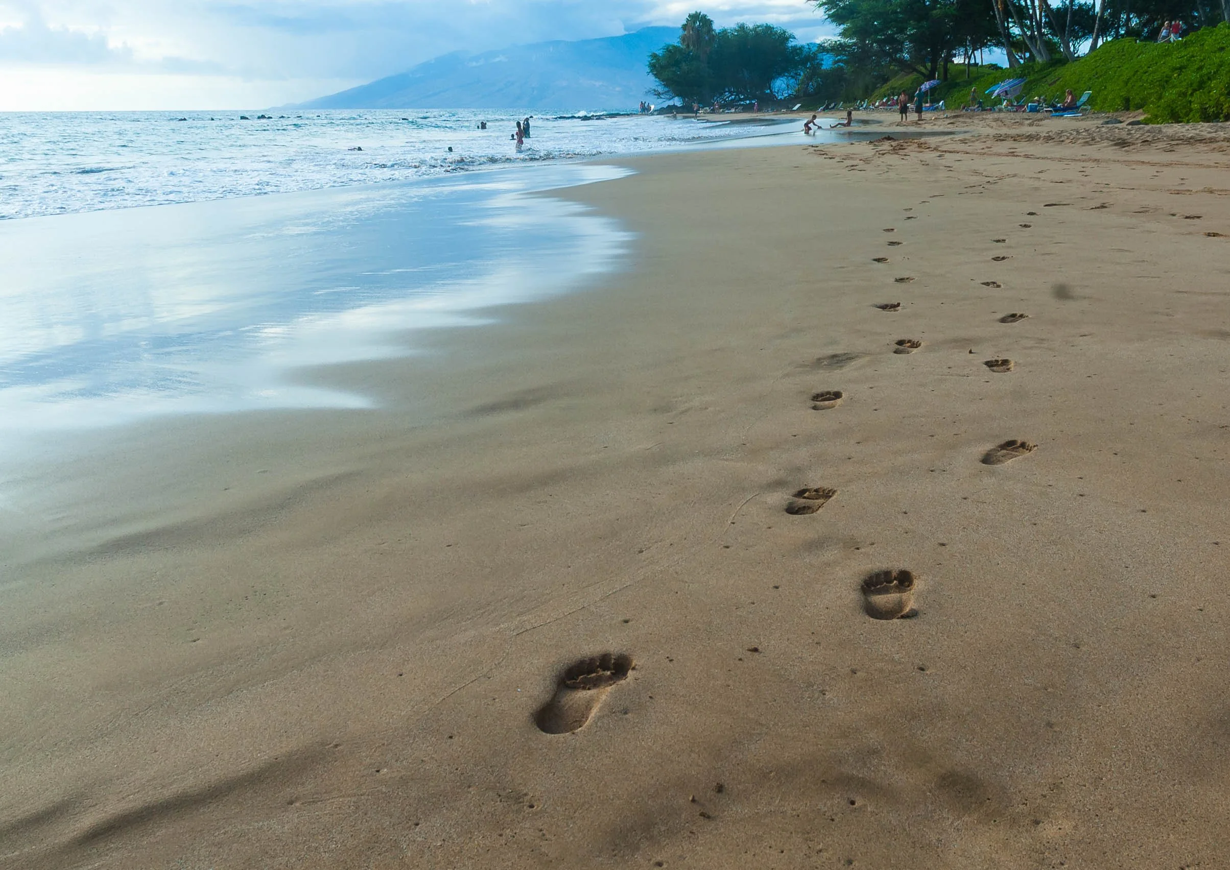 footprints on a beach in Hawaii