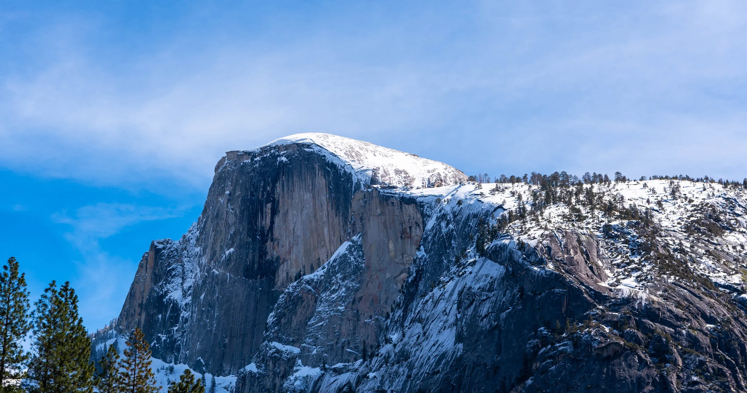 Half  Dome on a blue sky day in winter