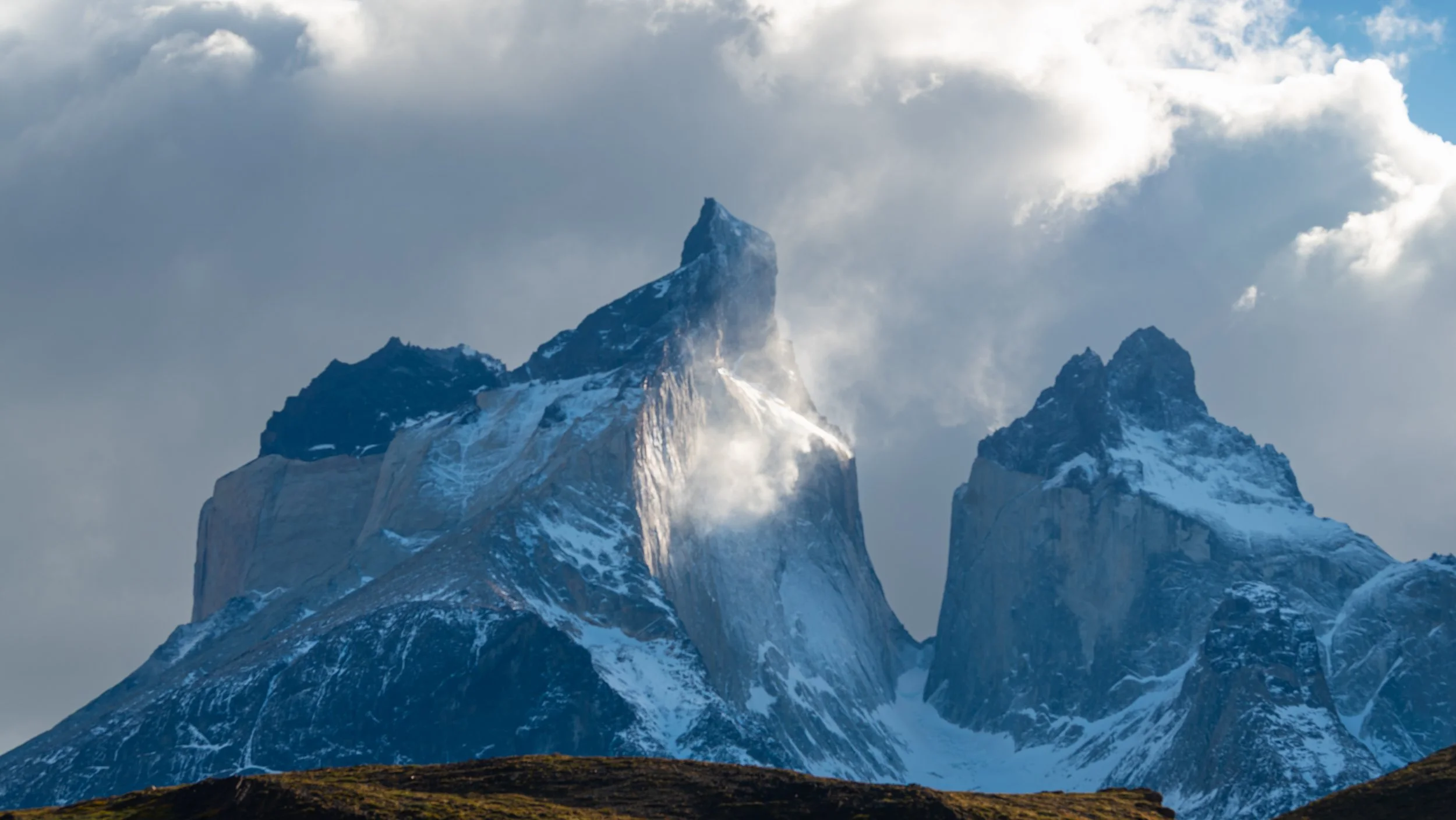 Torres del Paine horns with light shining on one side, terrifying "mouth"