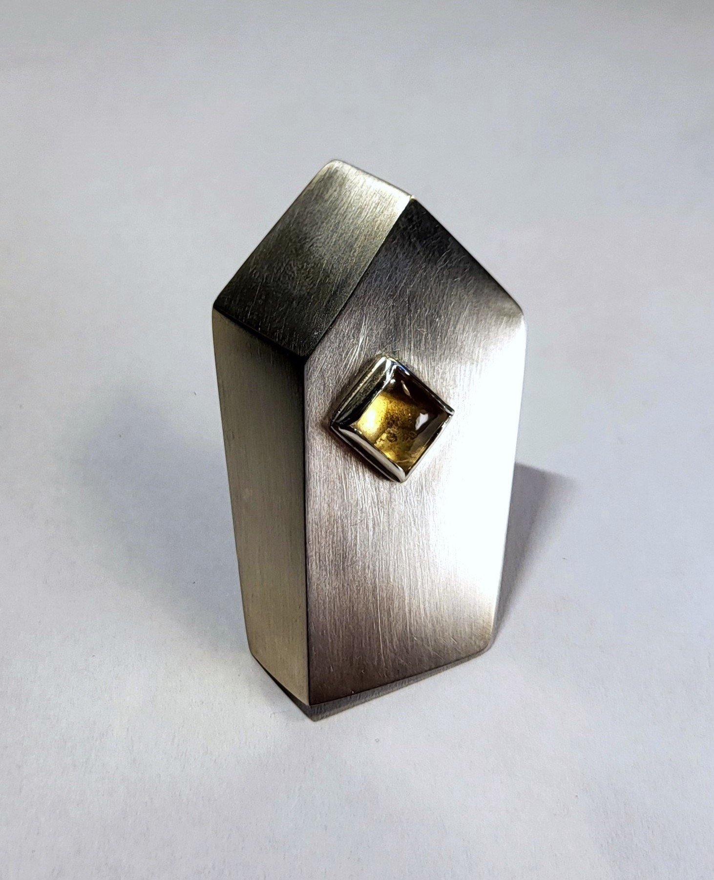 Hannah Proctor
Left (Brooch)
Sterling Silver, Steel, Citrine
$300