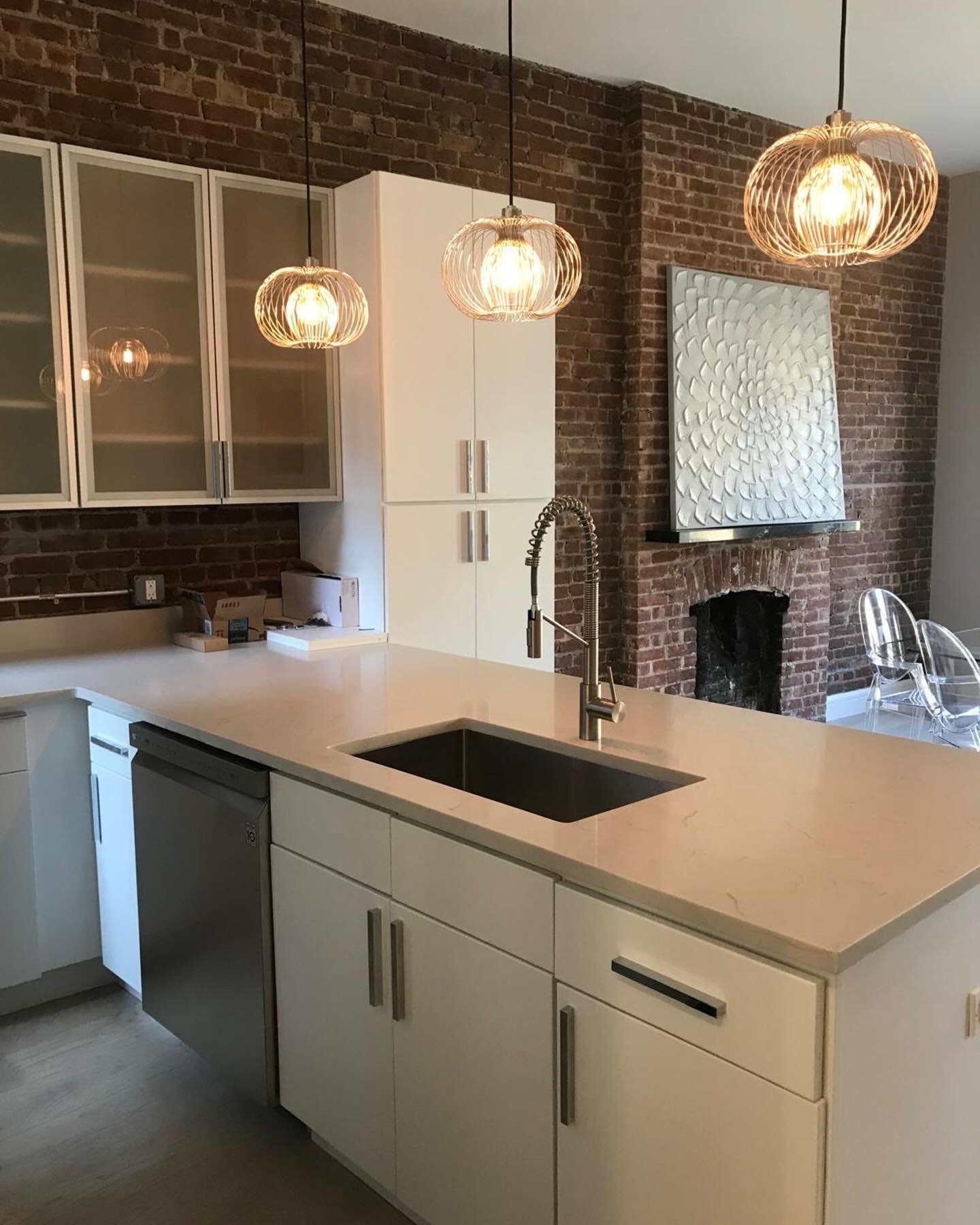*UWS Kitchen Glow-Up Part 2!* Let&rsquo;s talk about how far this kitchen really came. Before, this space was in serious need of help&mdash;cracked tiles, dull countertops, and years of wear and tear. But the biggest surprise? Gorgeous exposed brick 
