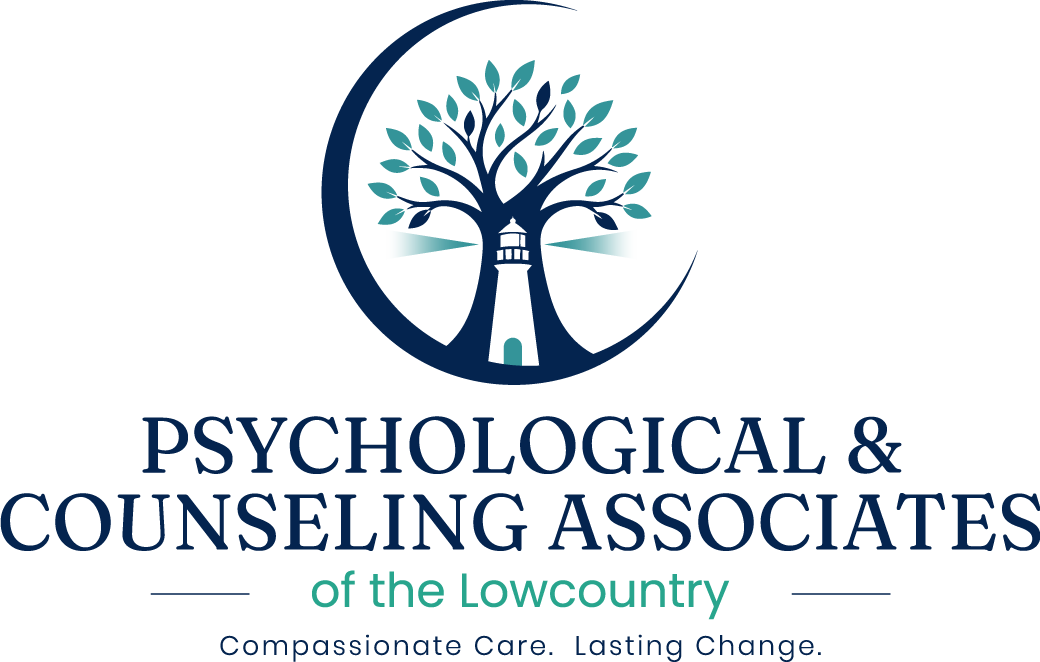 Logo for Psychological & Counseling Associates of the Lowcountry featuring a stylized tree with a lighthouse in the center, and the tagline "Compassionate Care. Lasting Change."
