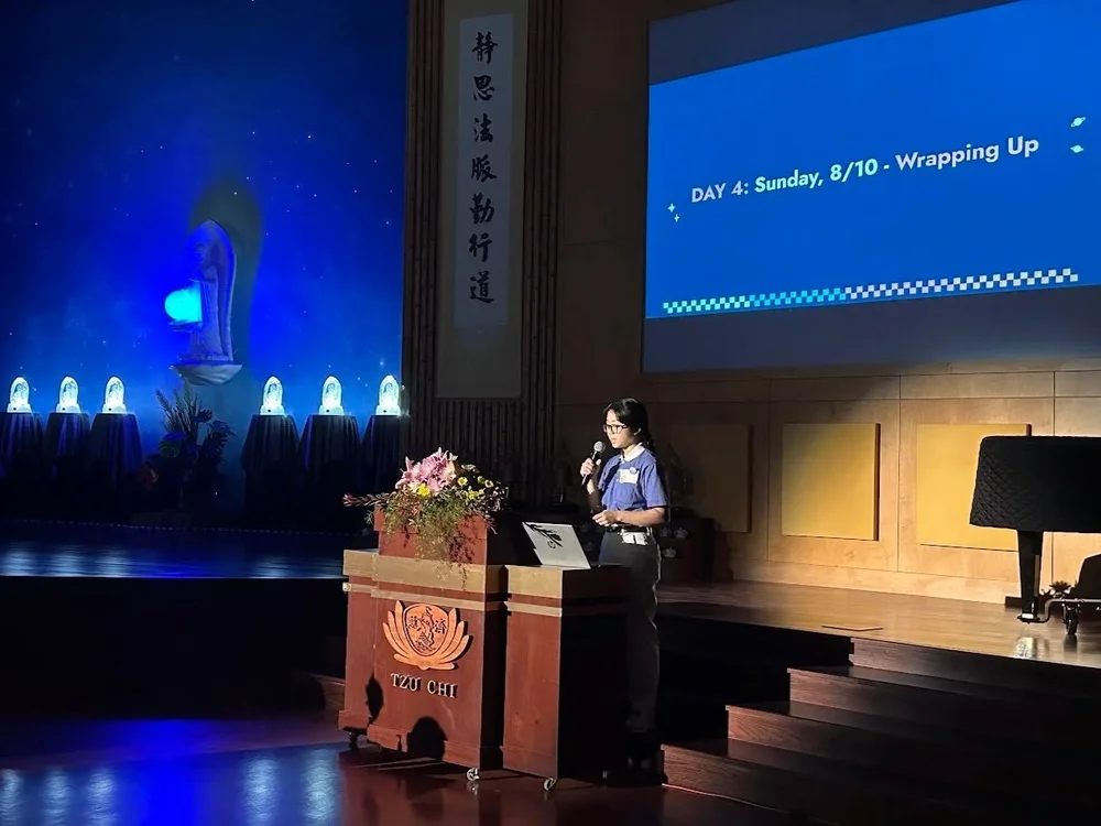 Brianna Voon emcees at the 2025 Tzu Chi Young Leaders Humanitarian Leadership Conference.