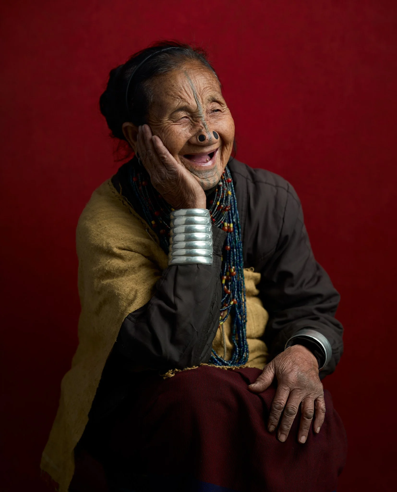 Apatani-tribe_Tattooed-Nose-Plug-Grandma_Photographer-Brett-Garamella.jpg