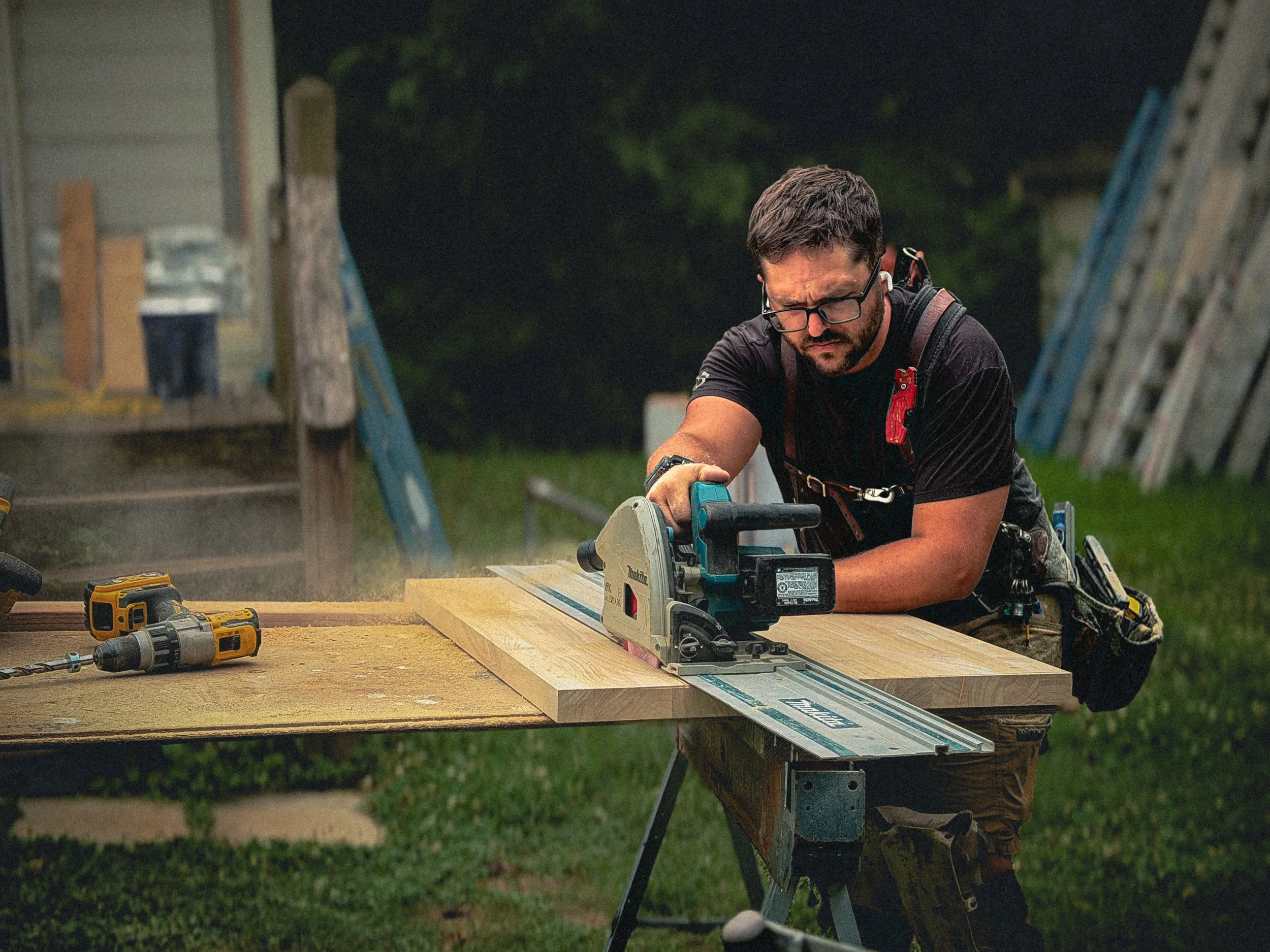 Carpenter using a tracksaw to trim down butcherblock for a kitchen remodel in Athens, GA