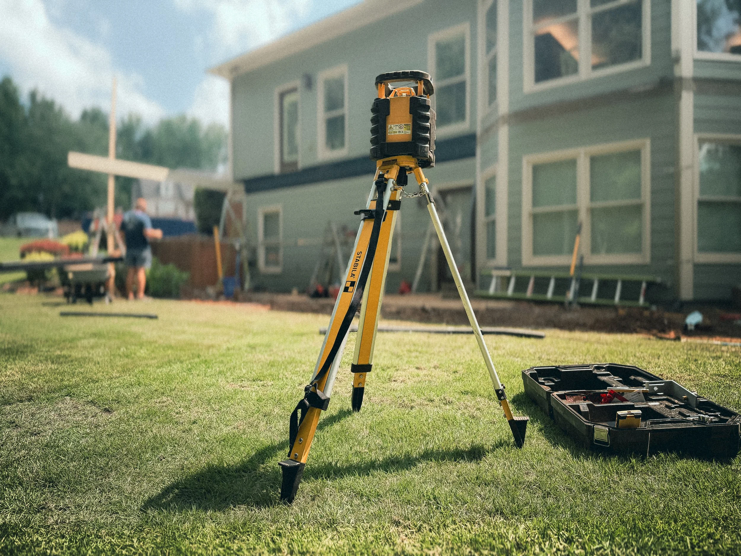 Stabilia LAR 150 Transit Laser Level being used to determine the deck post height