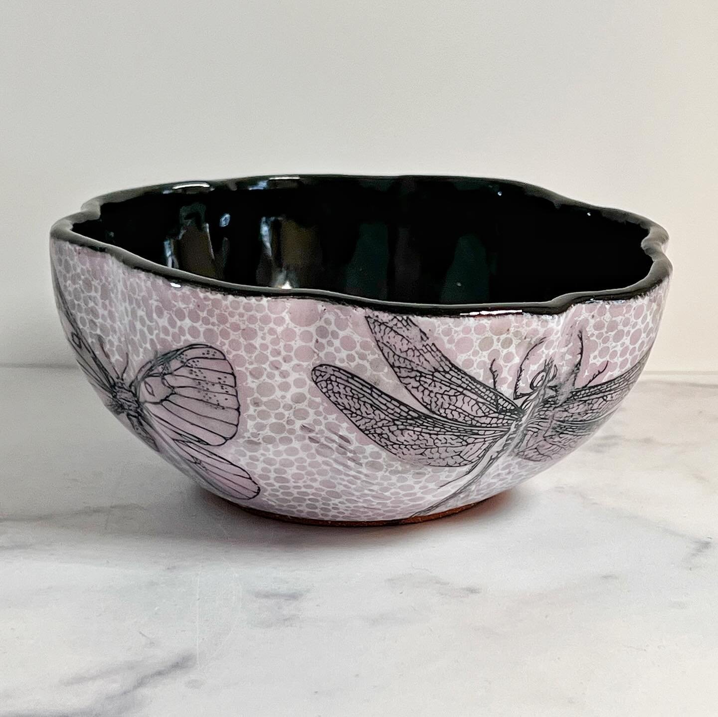 I like the way this bowl came out but wish I had used the black glaze on the inside right up to the pink slip/beetle. That orange (ring) is the color of the clay and doesn&rsquo;t work with this color combo. I decorated this bowl by painting it with 
