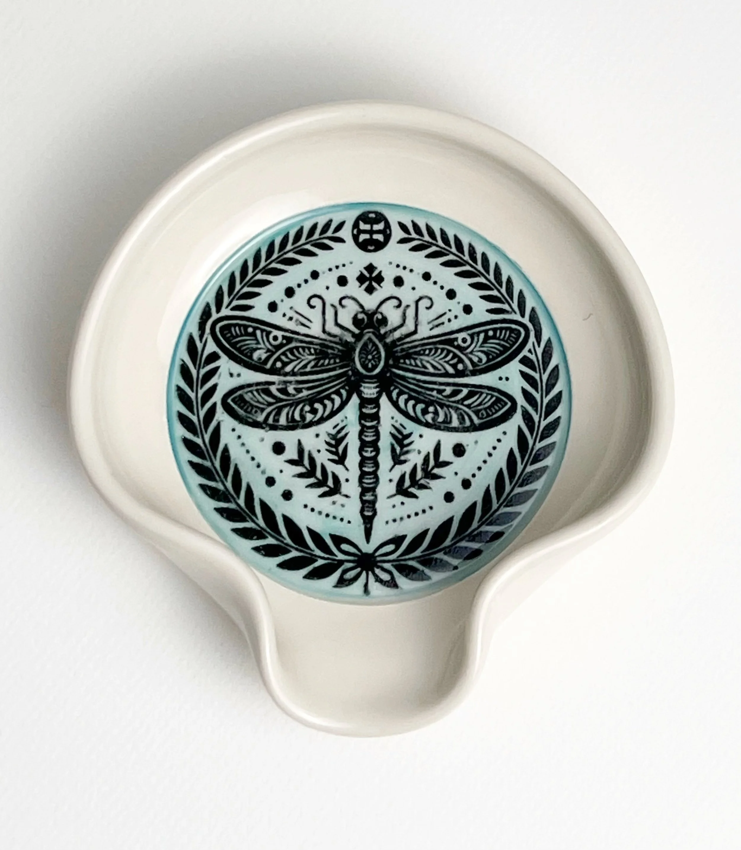 Porcelain spoon rest with the Dragonflies underglaze transfer. The color was brushed on first before applying the transfer. #underglazetransfers #printonclay
