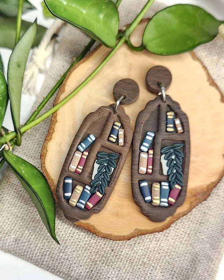 Anyone who knows me knows that I love reading. I've had my nose stuck in a book since I was little, so bookish earrings were inevitable at some point. I used to read anything I could get my hands on, but as I've gotten older (and had less time to rea