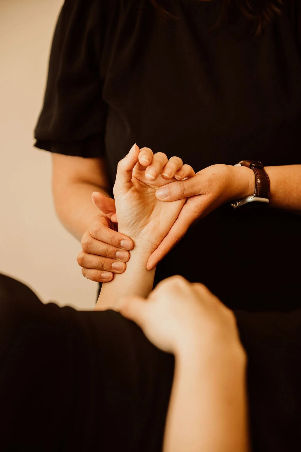 Micaela treats a patient who is pregnant at her acupuncture clinic in Doylestown, PA