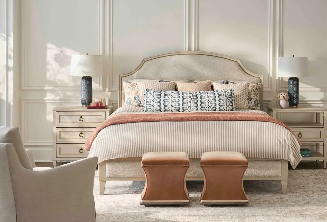 Rooted in traditional architecture, this bedroom feels calm and intentional. The Matteo Palazzo King Bed by @fairfieldchair anchors the space, cushioned by layered textiles and refined details. 

Available at @whitneyevansltd
Located at the @denverde