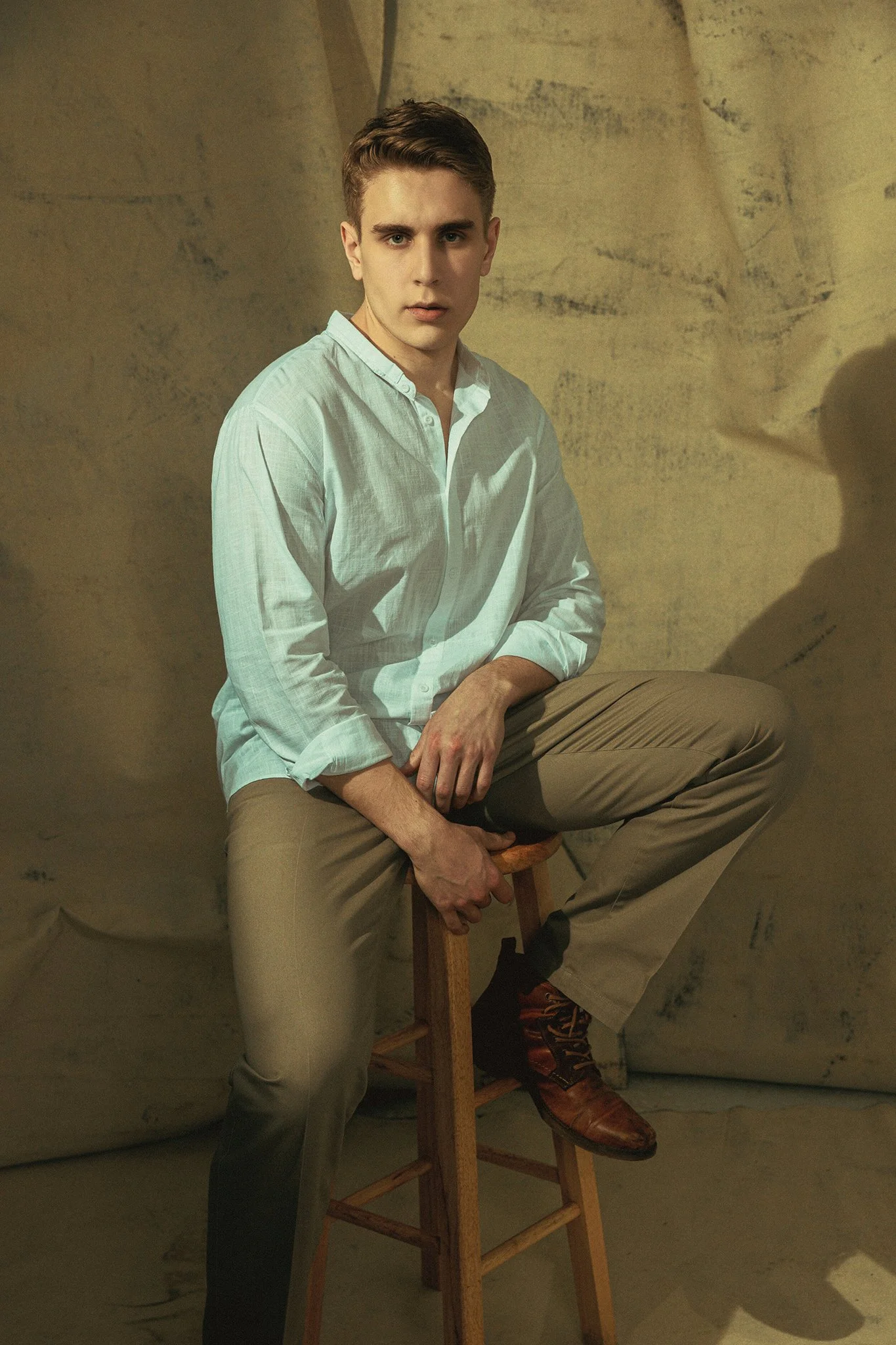 Man Fashion Portrait with Canvases.jpeg