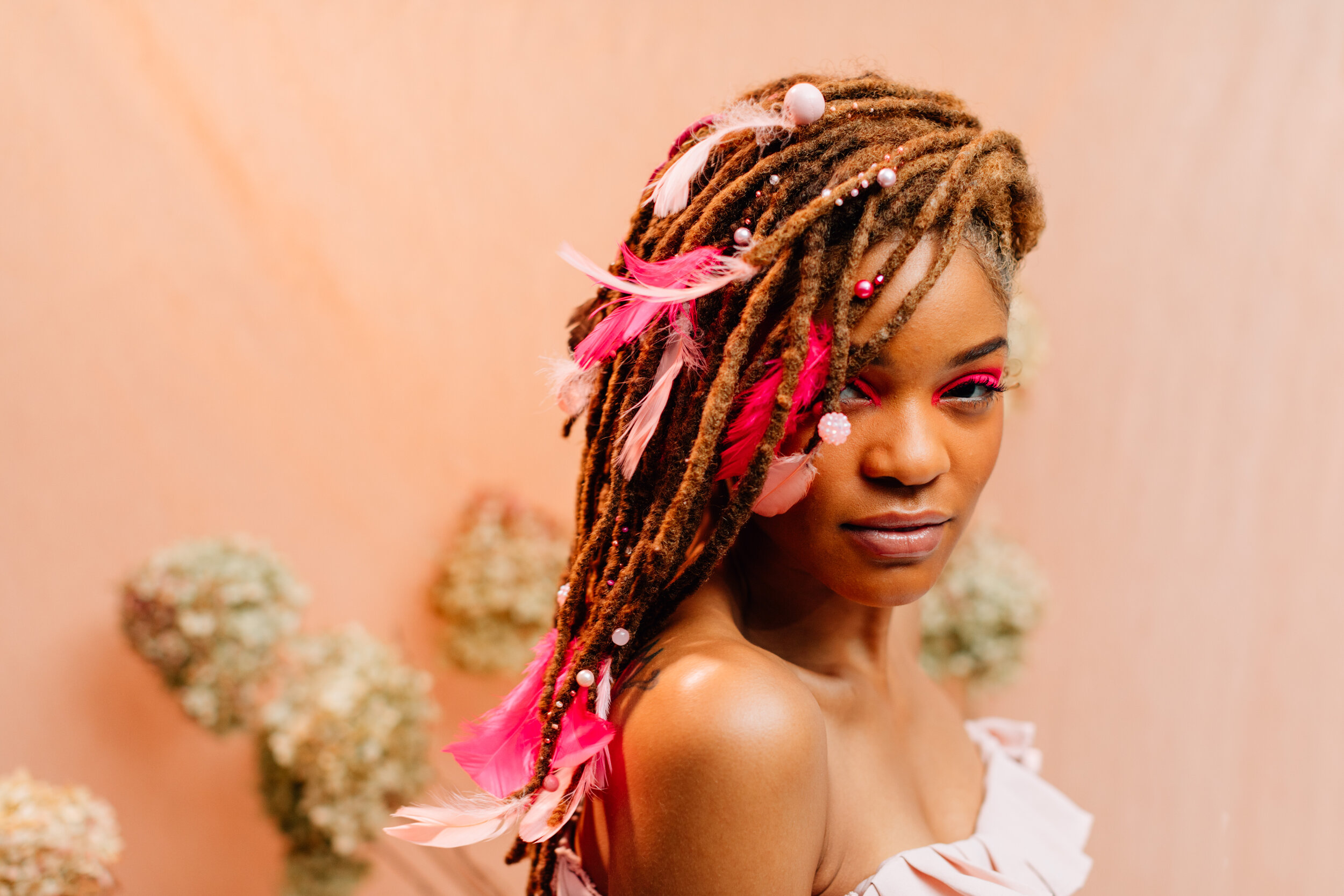 This Hairstylist's Hair Sprinkles Are the Prettiest New Way to Adorn Locs  — See Photos