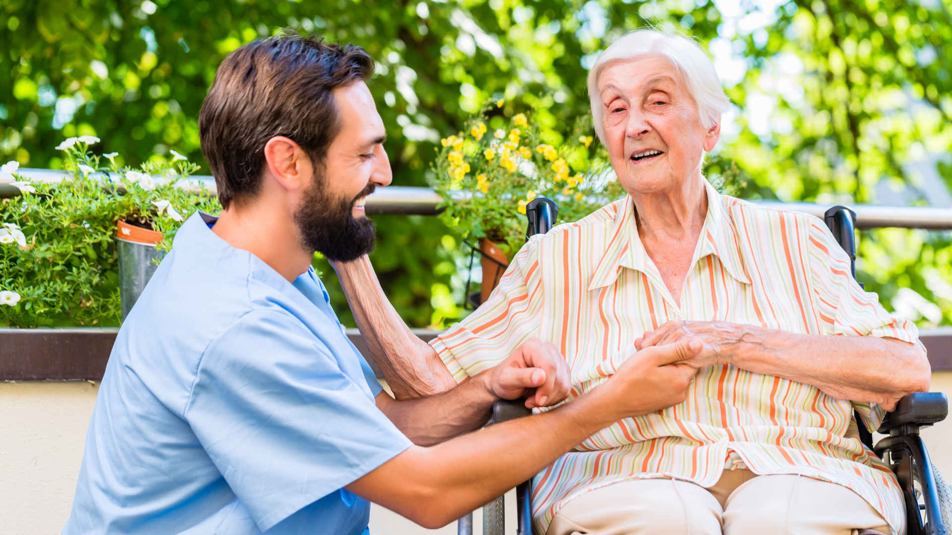 An Entrusted Transport healthcare professional building rapport and trust with a wheelchair patient