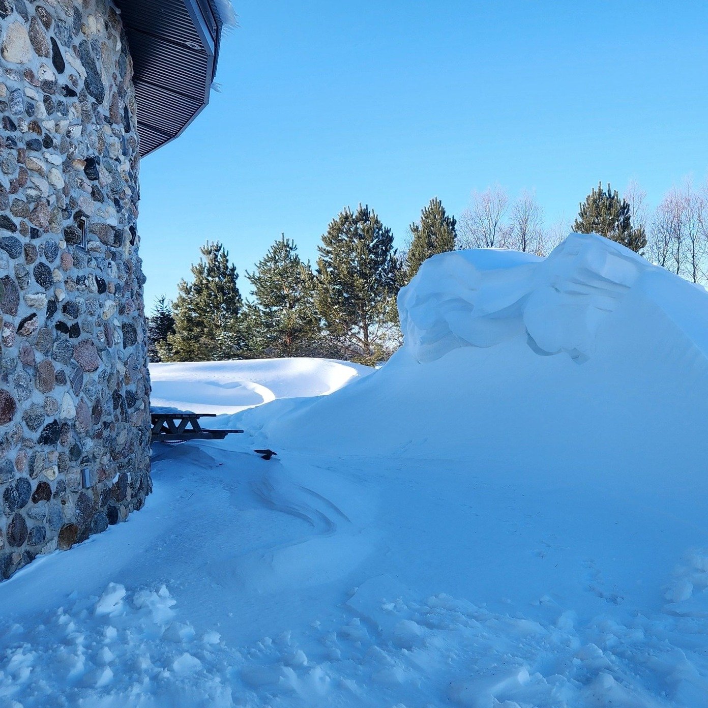 The snow drifts are getting pretty high! 🌬❄️