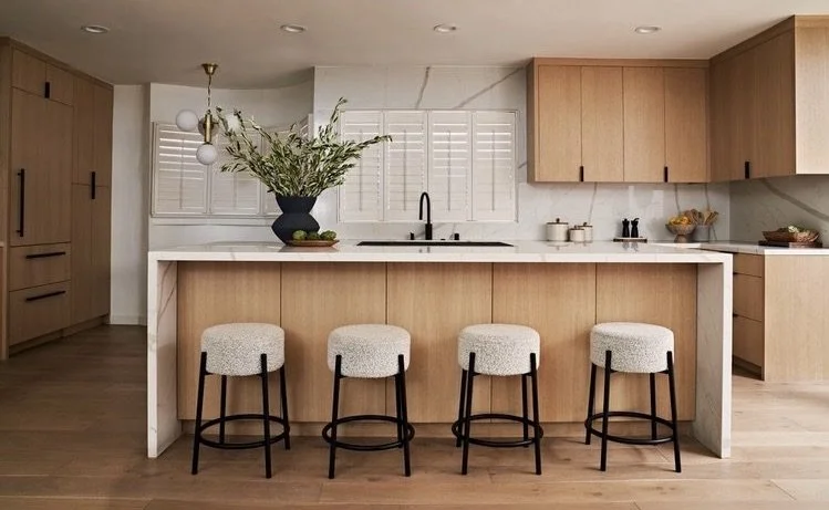Kitchen bar and countertop in white oak, and  CB2 barstools. Studio City residential interior design Los Angeles. Top 5 interior designers in Los Angeles.