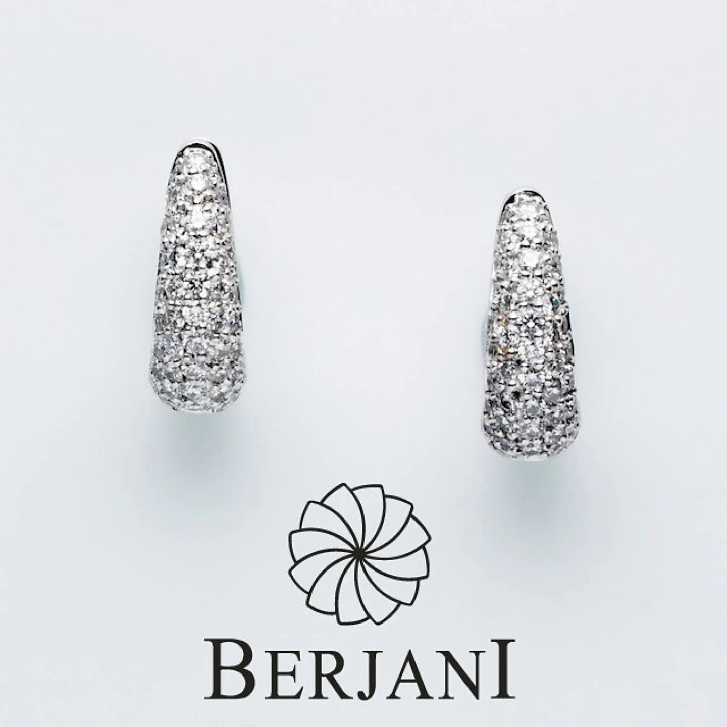 Frrrrossst someone you love this Christmas with a glitzy pair of BERJANI Signature handcrafted white gold pav&eacute; set diamond earrings. Beautifully hugs the ear-lobe with diamonds! It can be worn with almost anything... day or night... makes the 