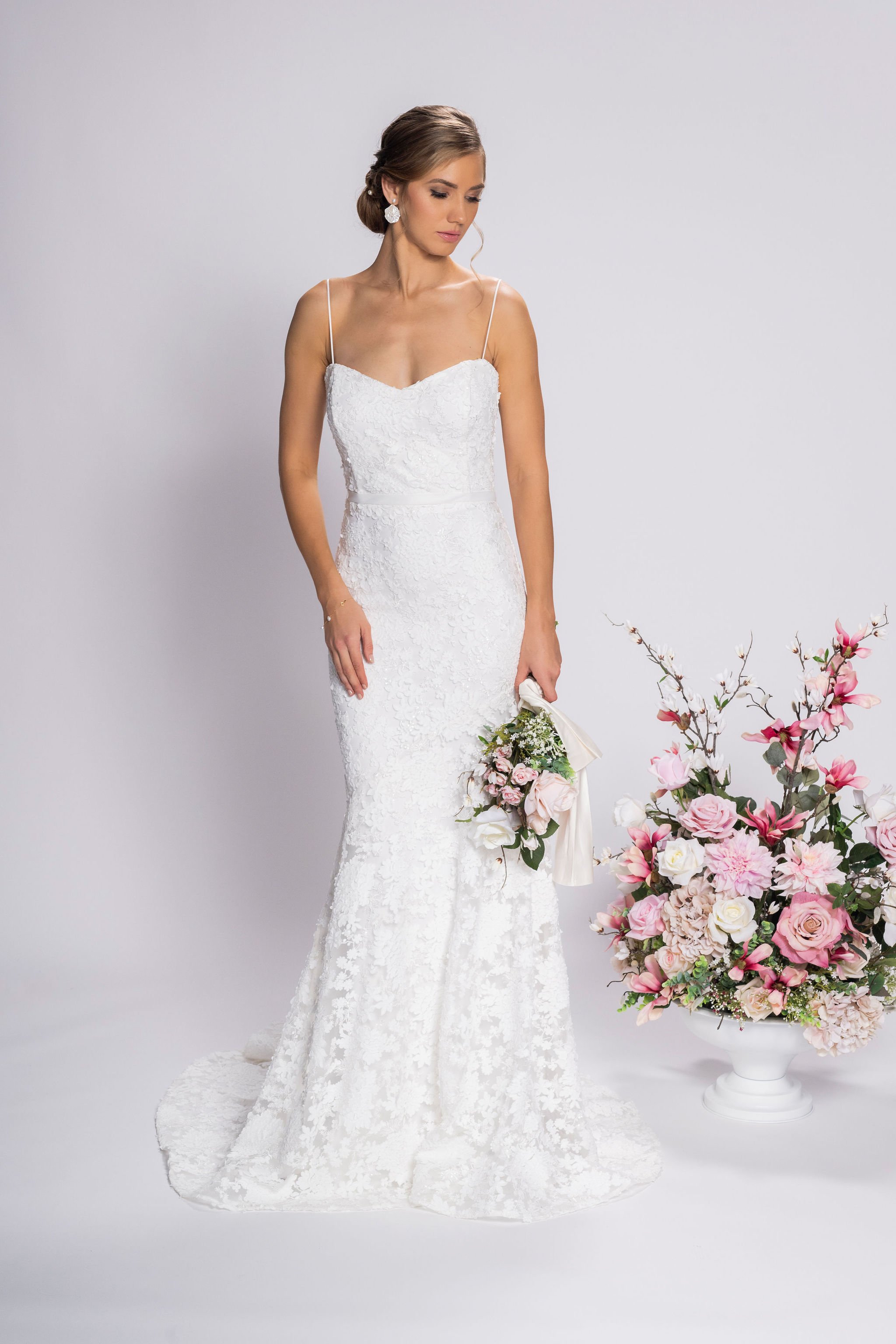 Most Pinned Wedding Dresses: 18 Gowns + FAQs