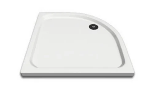 A white shower base with a drain hole in the corner.