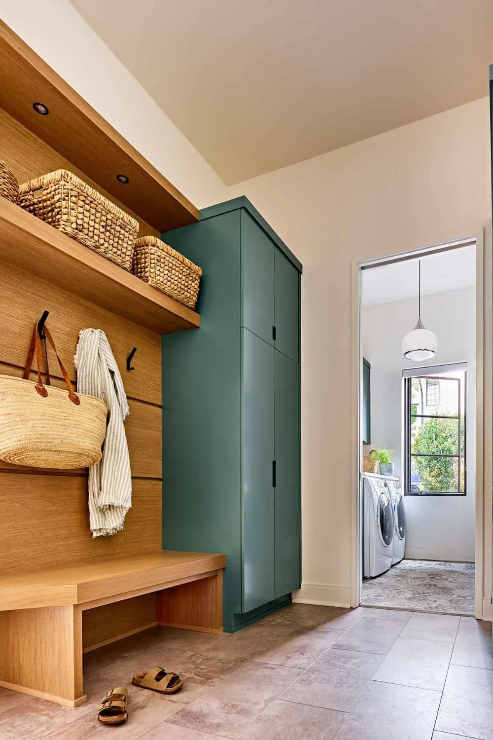 susan-hill-design-group-weddington-nc-wood-accents-in-home-mudroom-by-laundry-room-wood-bench-and-shelves-green-cabinet-collected-home-furnishings.jpg