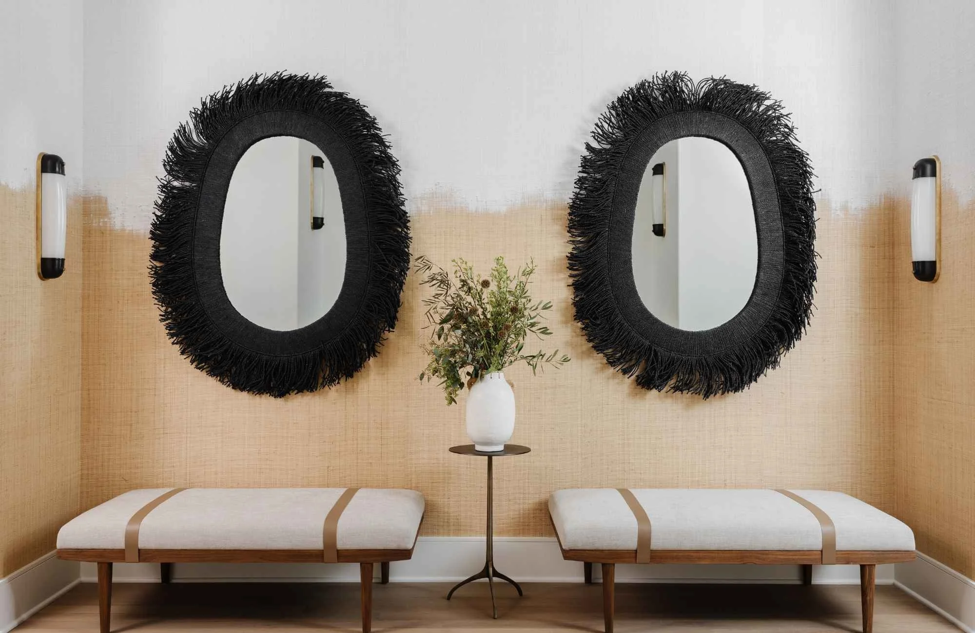 susan-hill-design-group-charlotte-nc-designing-a-personalized-home-two-benches-with-unique-black-oval-mirrors-clean-interior-design.jpg