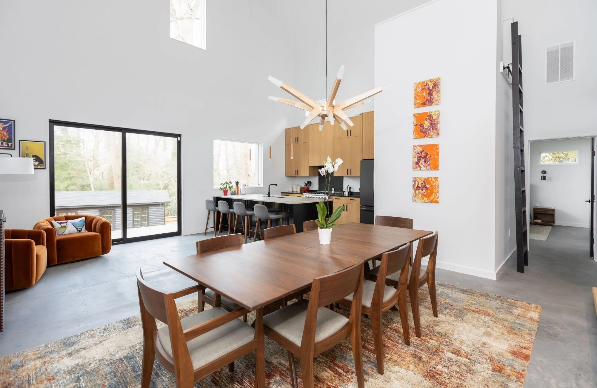 full-service-interior-designer-tega-cay-sc-home-design-for-entertaining-contemporary-open-floor-plan-dining-table-view-of-kitchen-high-ceilings-turnkey-custom.jpg