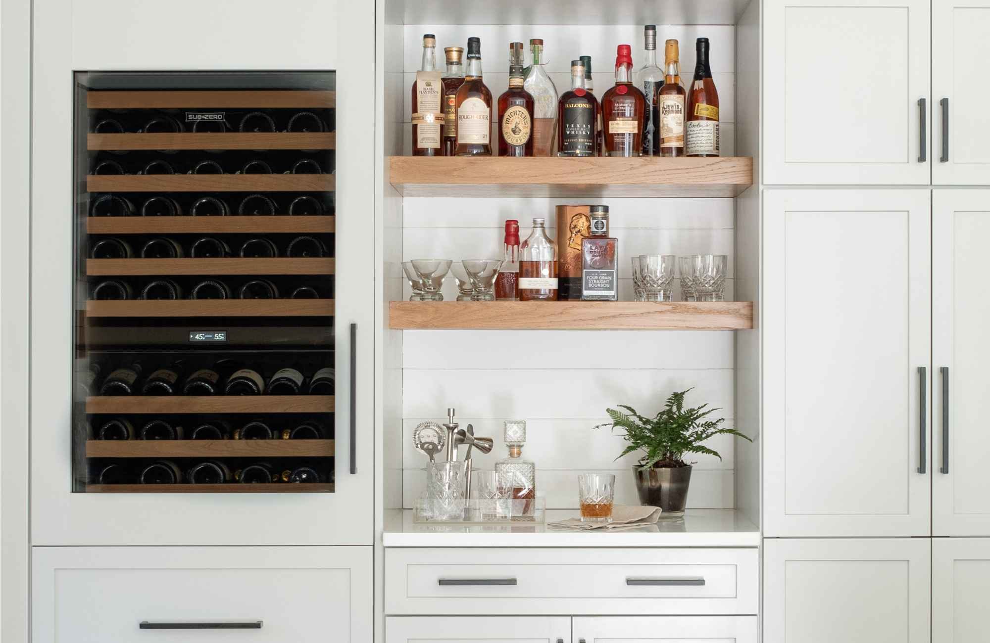 full-service-interior-design-charlotte-nc-kitchen-backsplash-options-kitchen-bar-with-built-in-beverage-fridge-wood-shelves-shiplap-backsplash-comfort-new-build.jpg