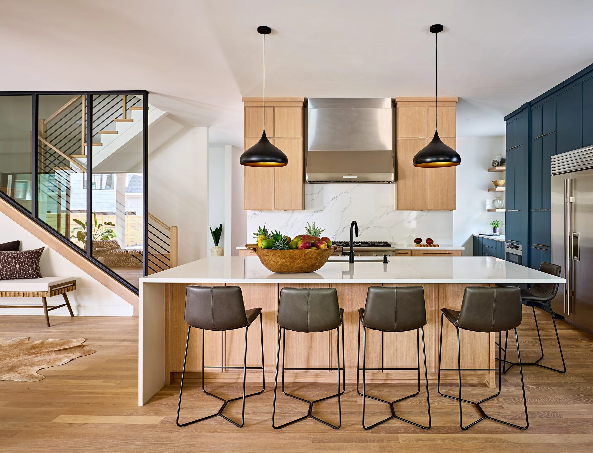 full-service-interior-designer-lake-wylie-sc-open-vs-closed-floor-plan-contemporary-kitchen-large-island-wood-cabinets-and-floor-staircase-sanctuary.jpg