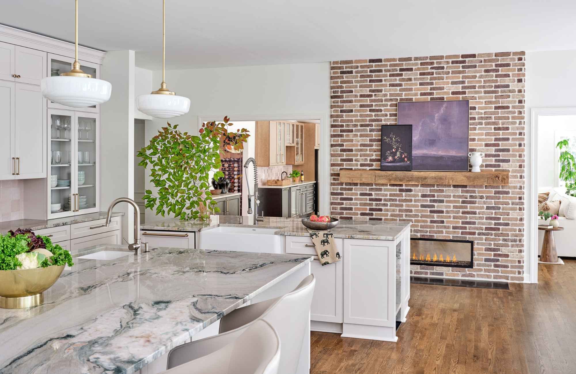 susan-hill-design-group-tega-cay-sc-open-vs-closed-floor-plans-new-kitchen-with-brick-fireplace-wall-separating-living-area-comfort-home-furnishings.jpg