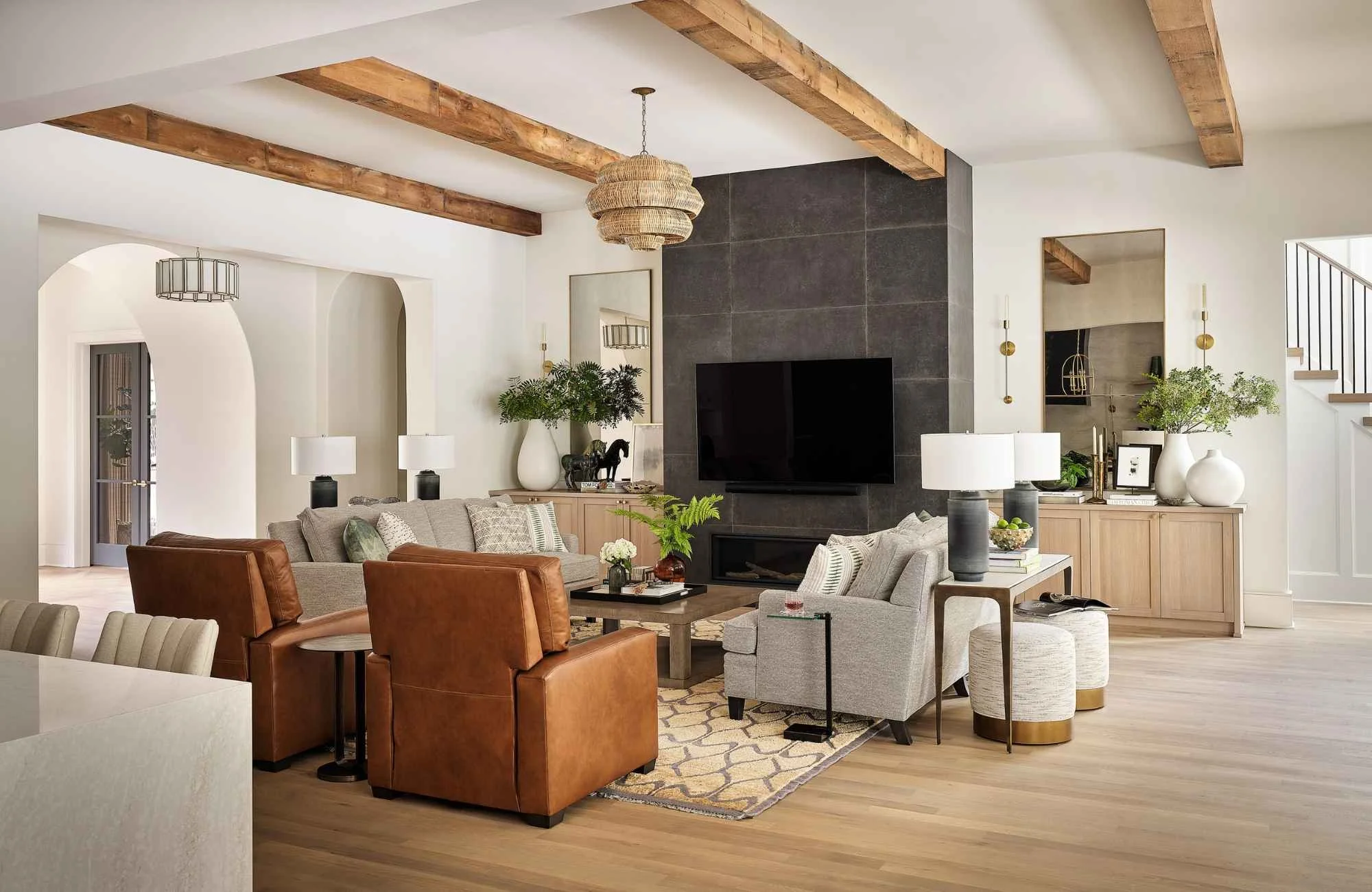 full-service-interior-design-wesley-chapel-nc-interior-design-misconceptions-luxury-family-living-room-wood-ceiling-beams-dark-feature-fireplace-comfortable.jpg
