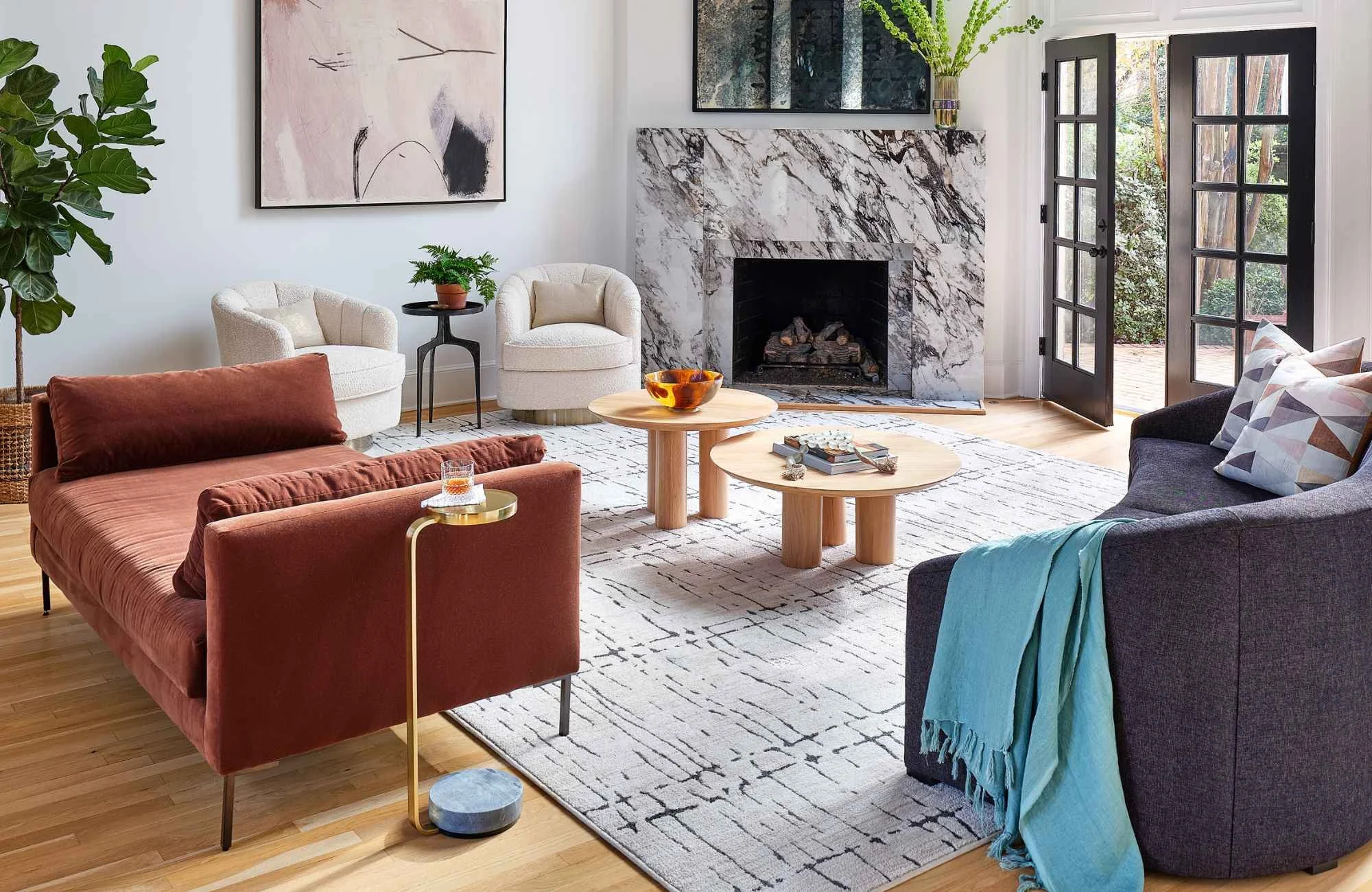 susan-hill-design-group-cornelius-nc-choosing-high-quality-rugs-living-room-custom-rug-deep-colored-furnishings-black-doors-to-outside-turnkey.jpg