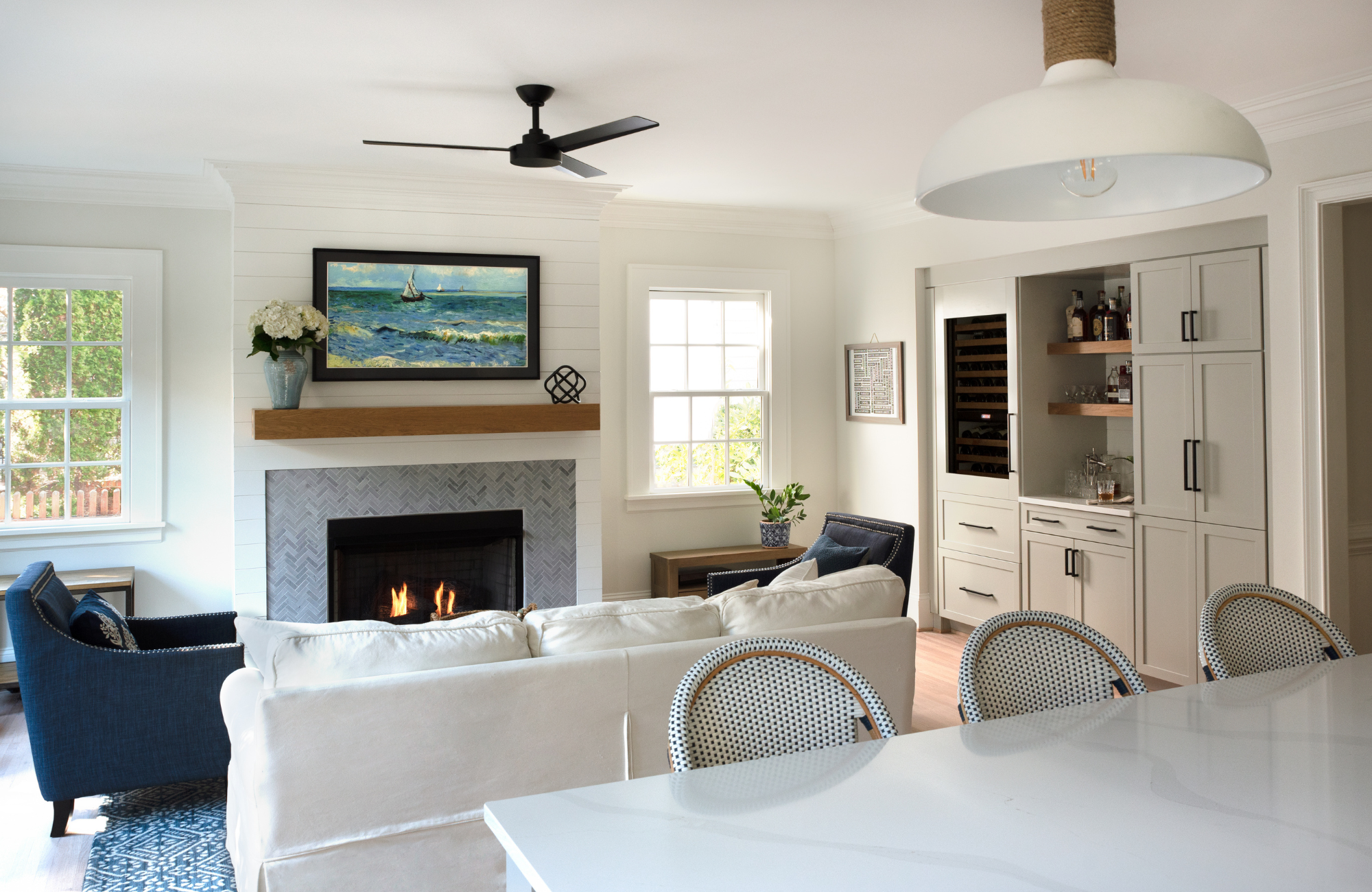 susan-hill-design-group-cornelius-nc-defined-areas-in-open-floor-plan-kitchen-island-and-living-room-built-in-cabinets-cozy-sanctuary.png