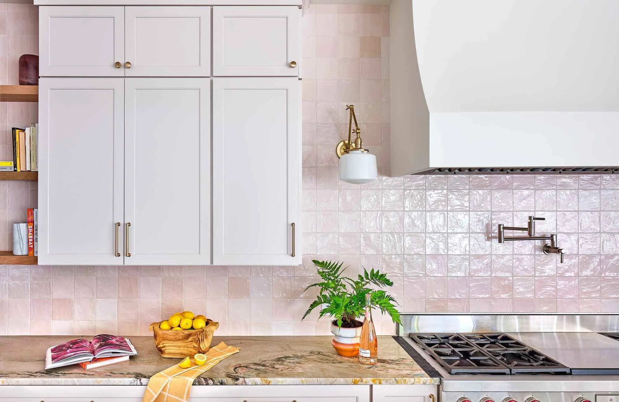 susan-hill-design-group-fort-mill-nc-kitchen-backsplash-options-white-cabinets-and-range-hood-with-soft-pink-backsplash-tile-timeless-custom-home.jpg