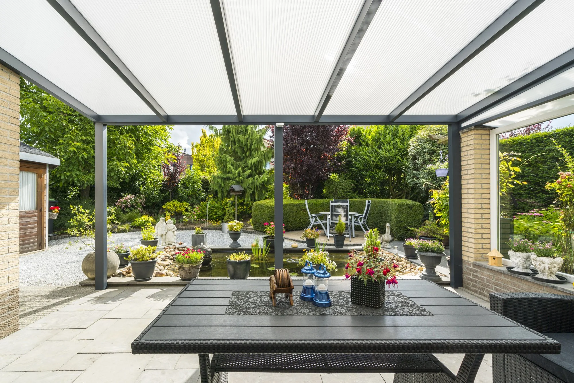 Modern aluminium veranda overlooking landscaped garden.jpg