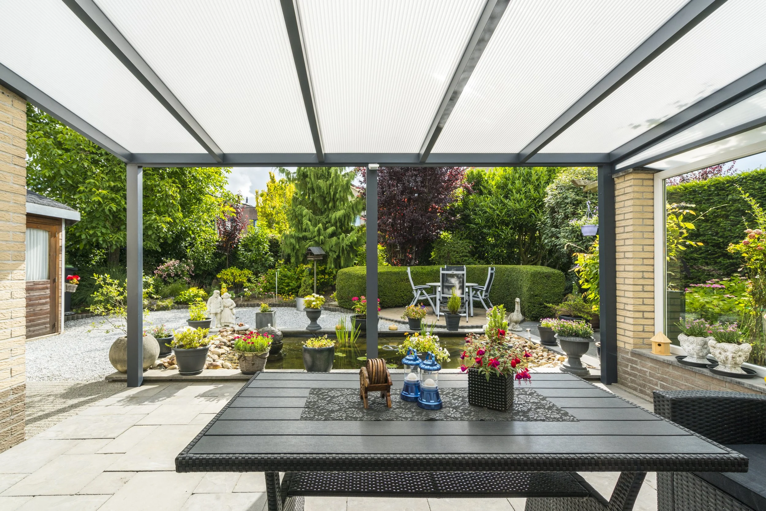 Modern aluminium veranda overlooking landscaped garden.jpg