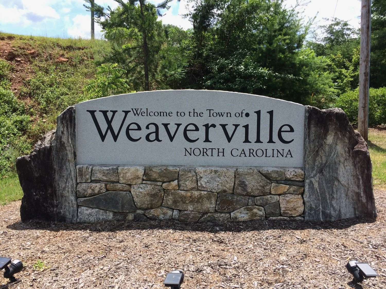 Weaver Boulevard sign. We split one giant boulder for both ends of the sign.