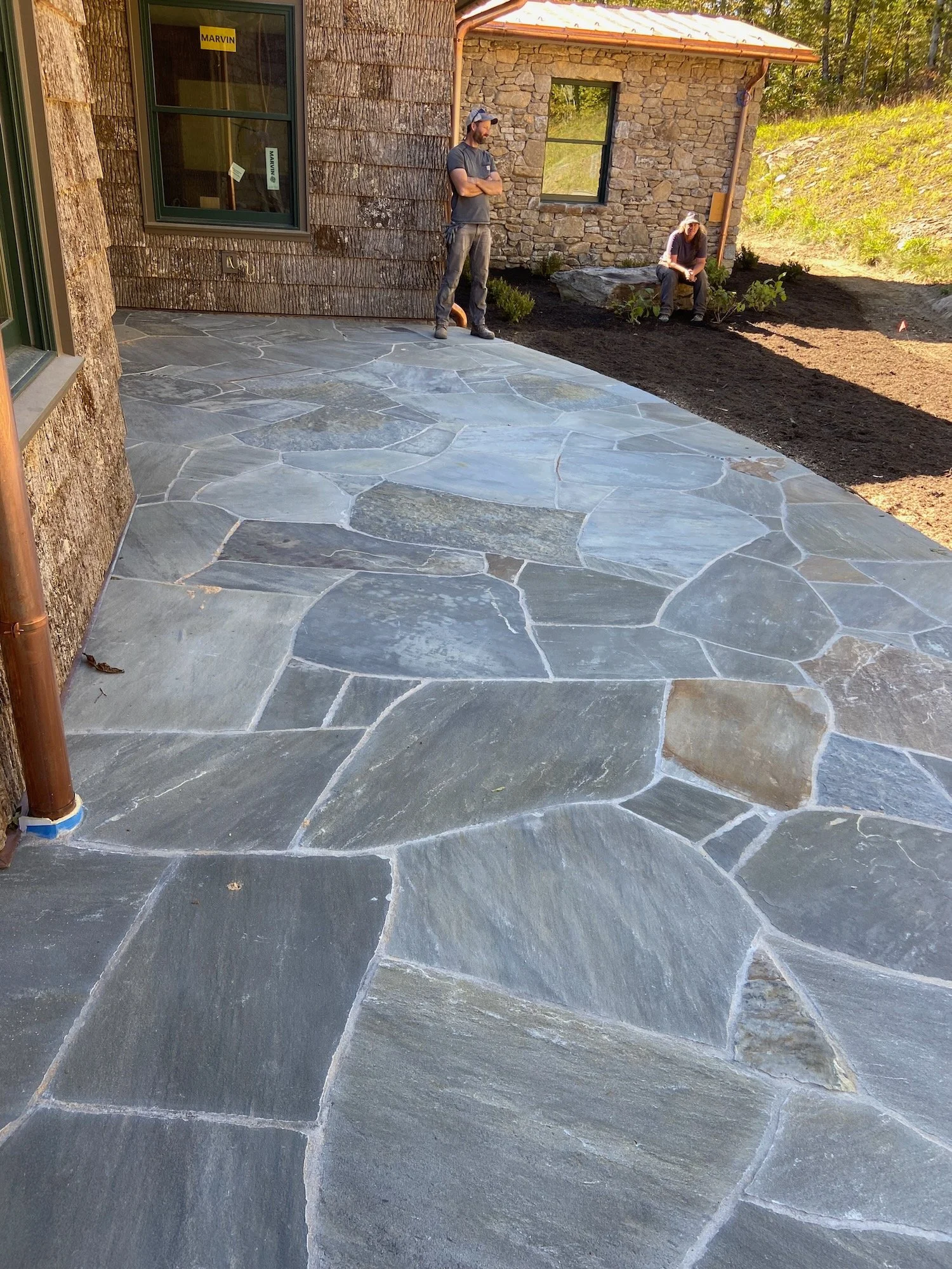 We pre-fabricated the majority of this mortar patio at the shop. This is installed on top of a mountain in Fairview.
