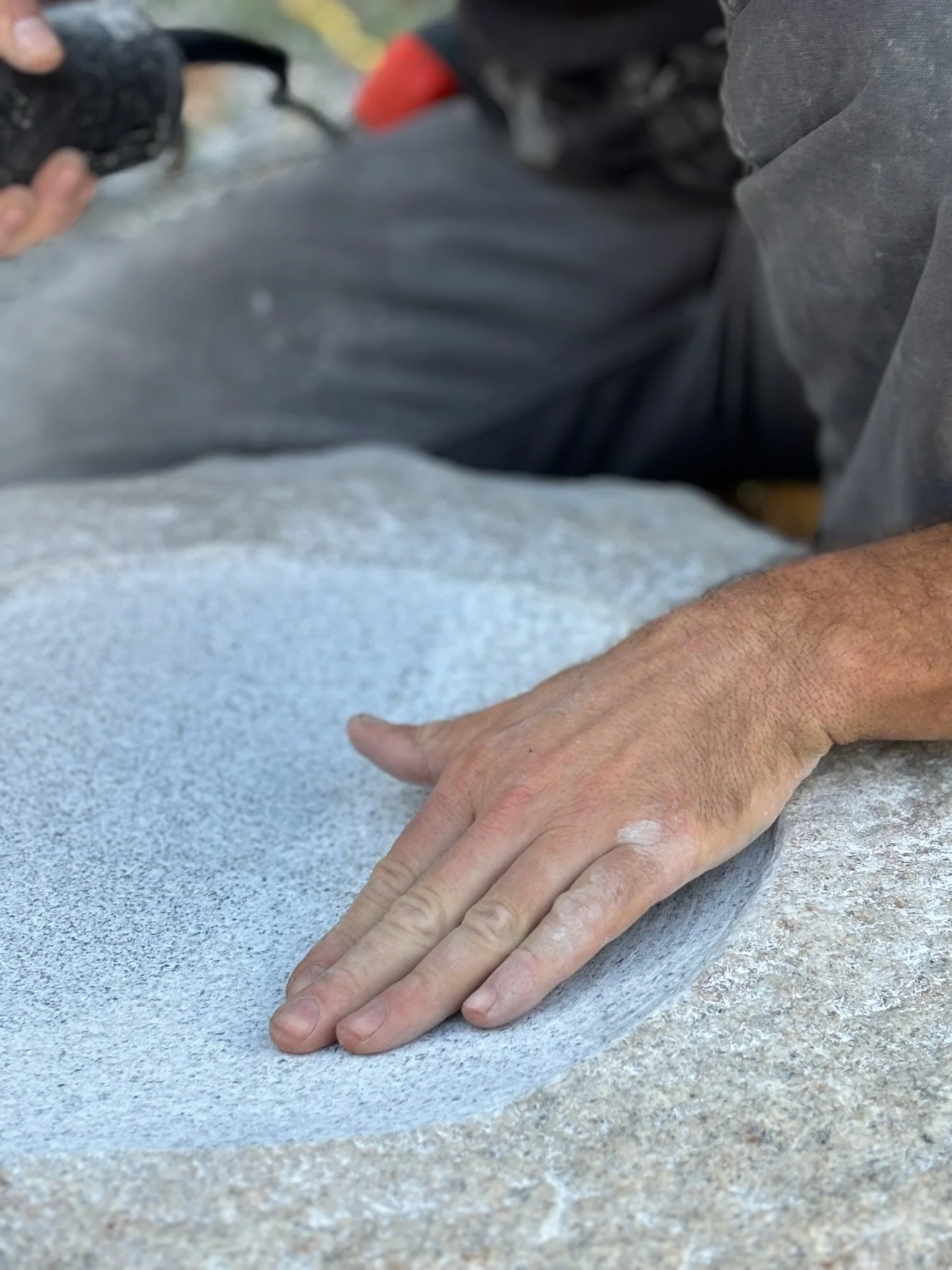 Jonathan carving a bird bath