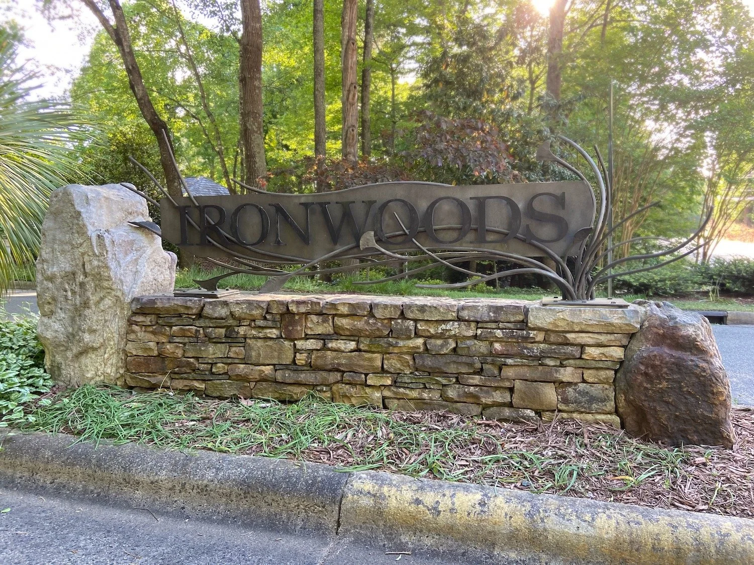 Ironwoods neighborhood sign, Chapel Hill.  Metal work by Lynda Metcalfe