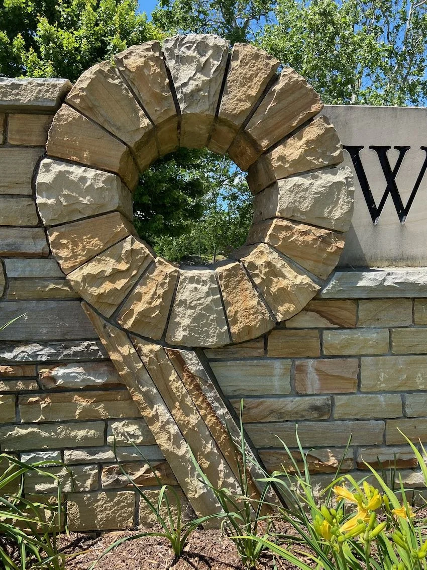 Detail of the moongate, which echoes a fiddlehead fern as well as a nearby water wheel. Lake Louise, Weaverville