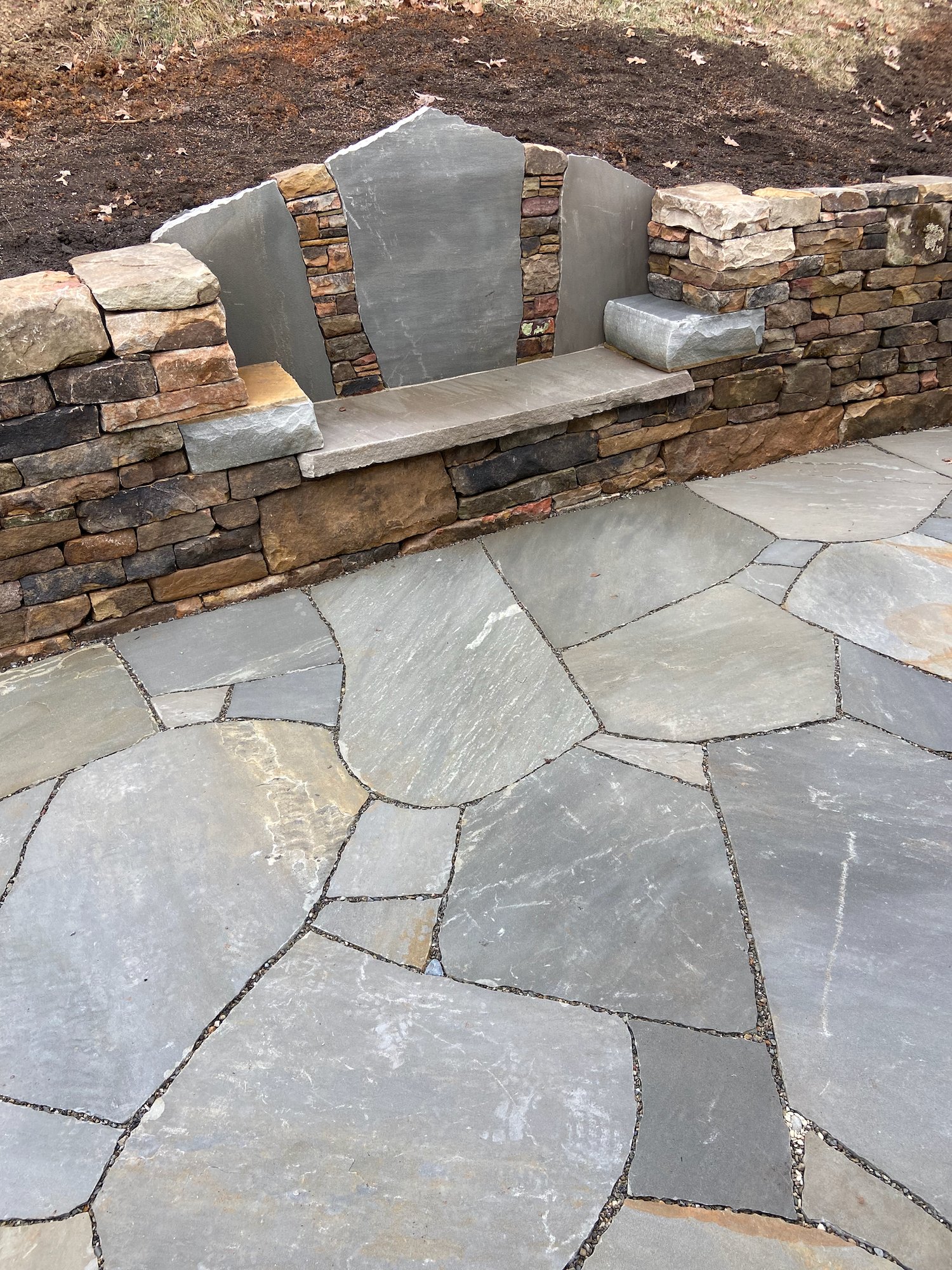 Drystone patio with bench and wall