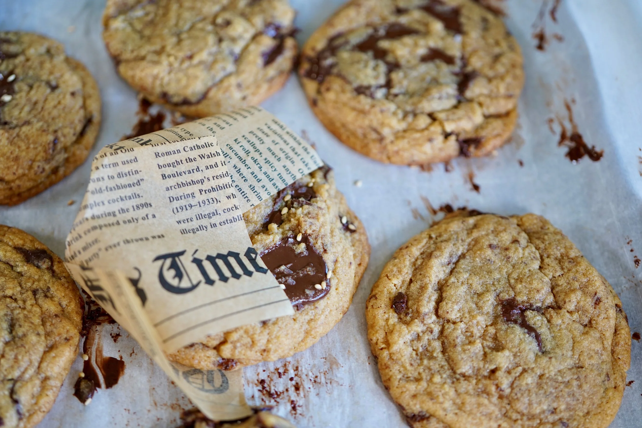 miso chocolate chip cookies laid out on baking sheet