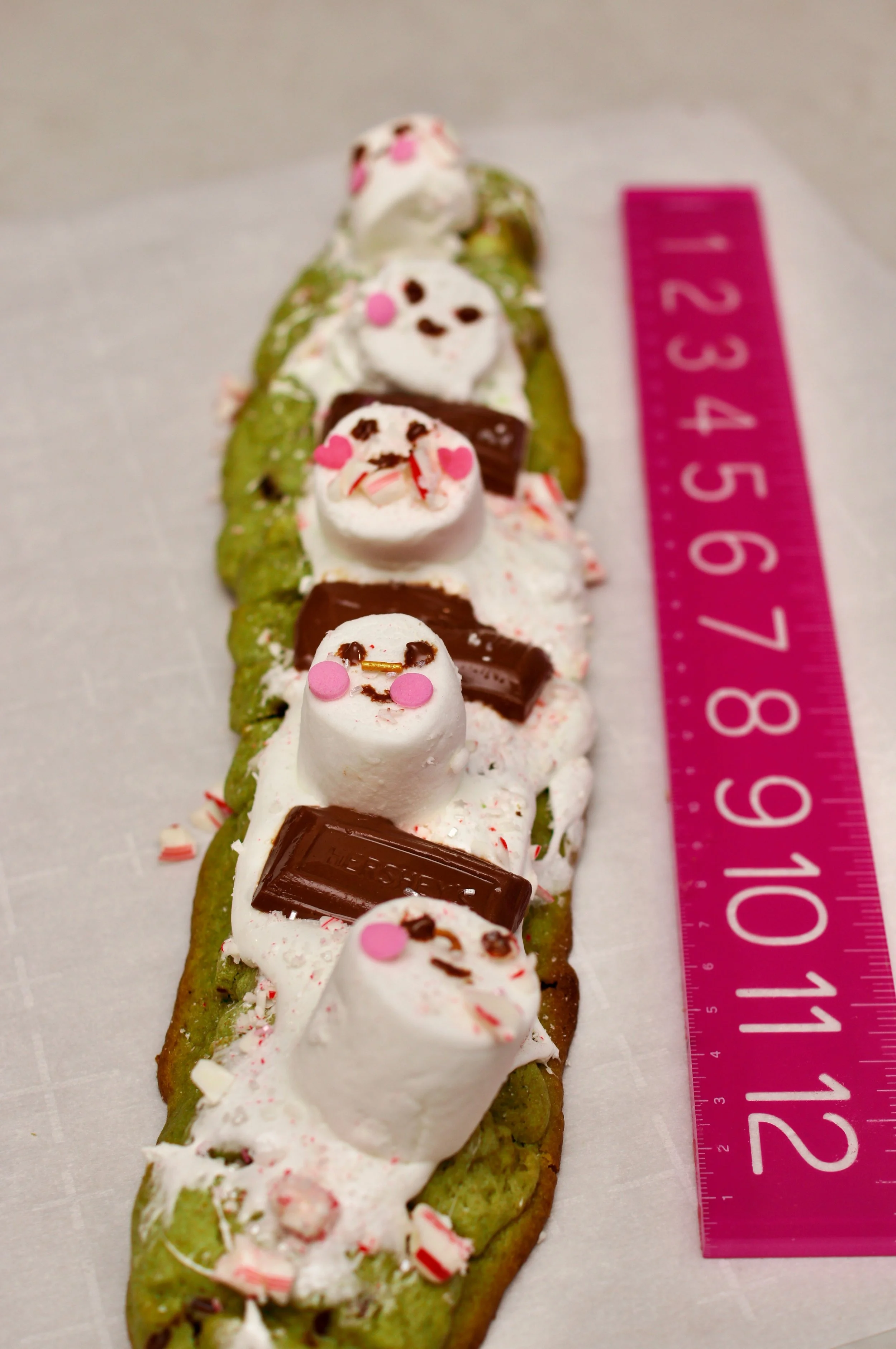 footlong cookie with marshmallow snowmen ad chocolate accents