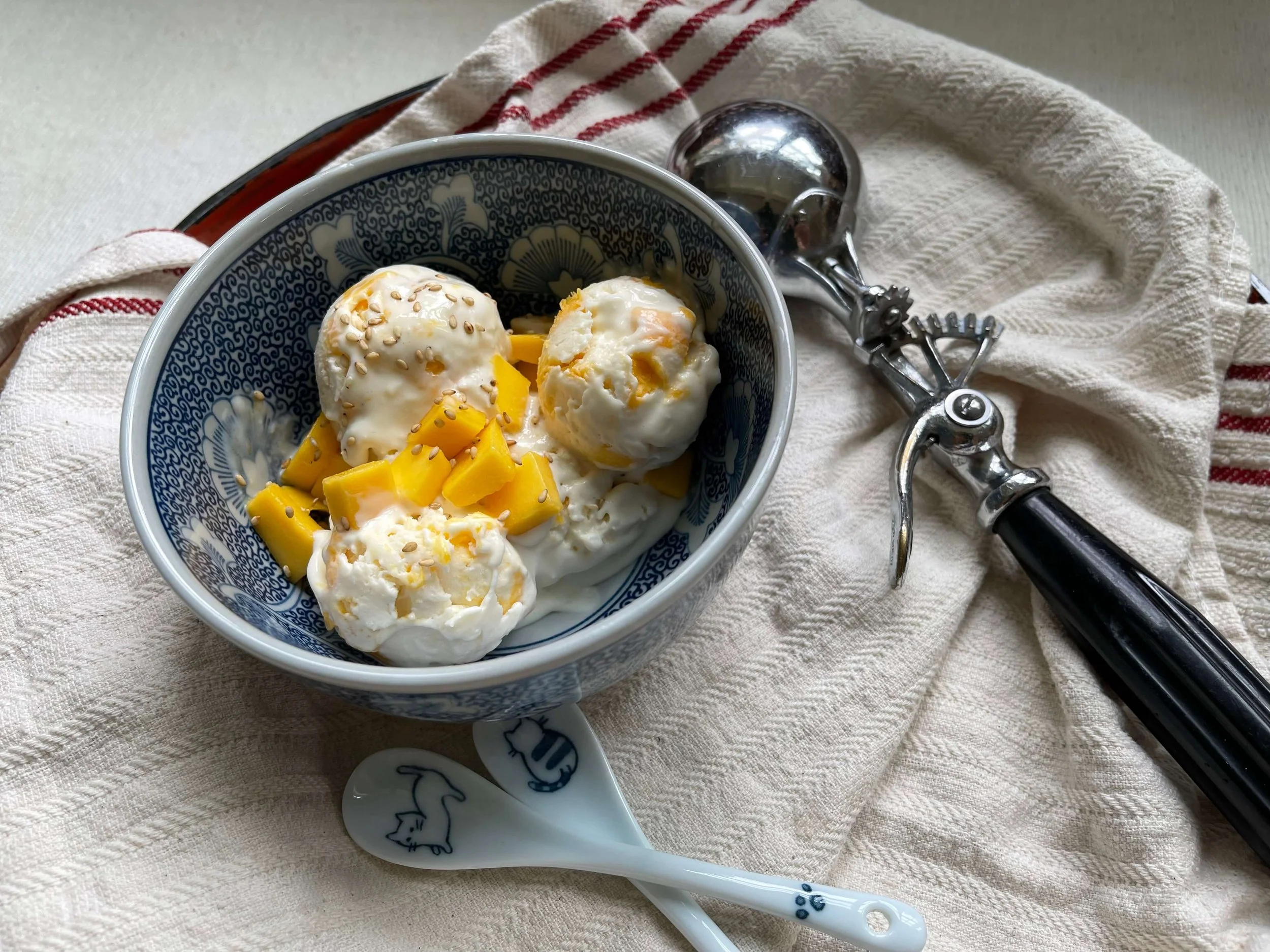 scoops of mango sticky rice ice cream