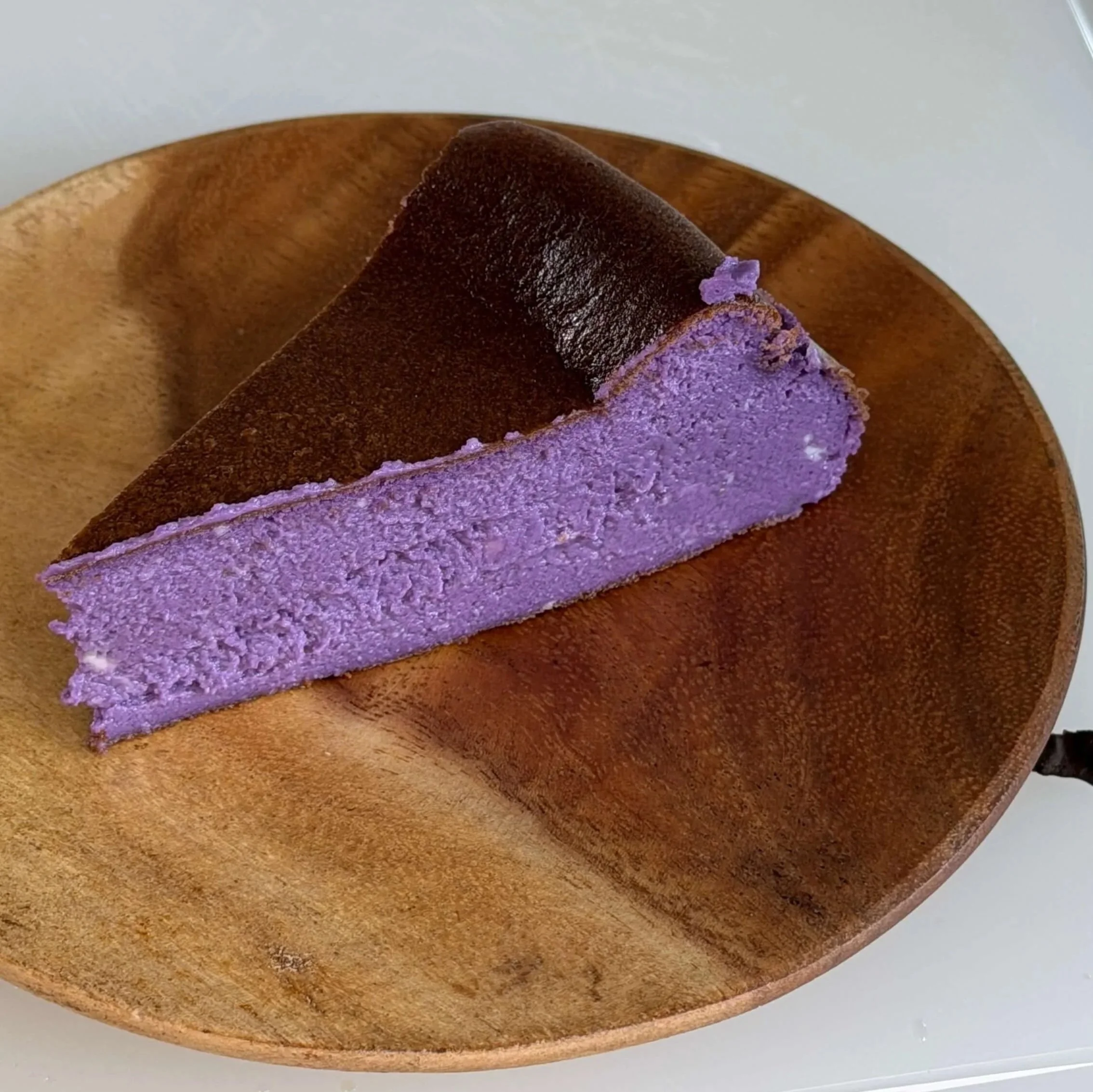 slice of ube cheesecake